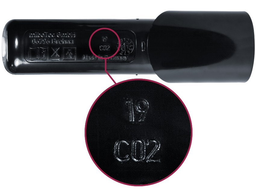 The batch number of the heating pen is stamped on the long underside.